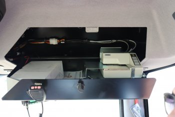 V horní části kabiny se nachází i tiskárna sloužící k tisku protokolu zákazníkovi